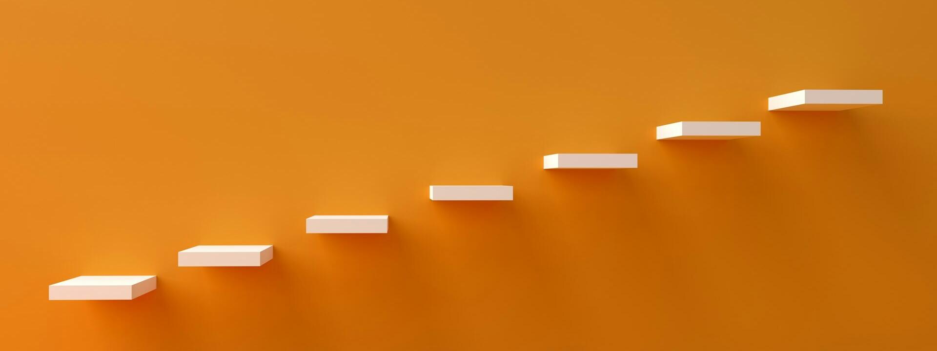 Minimalisitische Treppe. Stufen an einer orangefarbenen Wand.